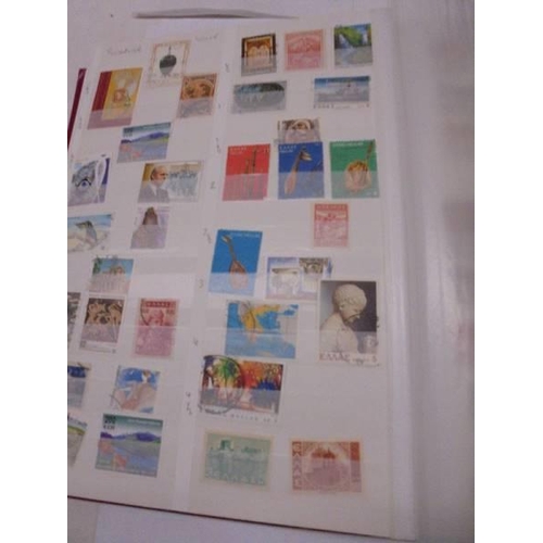 1174 - An album of world stamps.