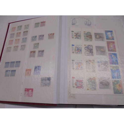 1174 - An album of world stamps.