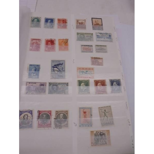 1174 - An album of world stamps.