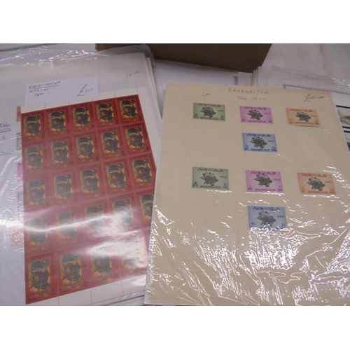 1175 - A box containing a large quantity of mini collections of stamps on sheets from many countries of the... 