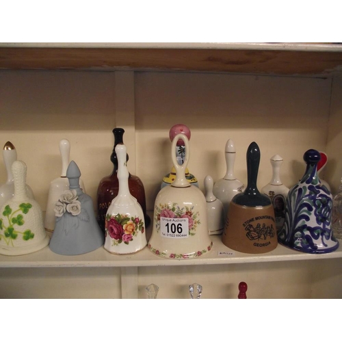 106 - 4 shelves of collectable china and glass bells