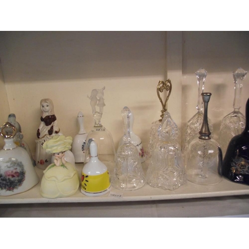 106 - 4 shelves of collectable china and glass bells