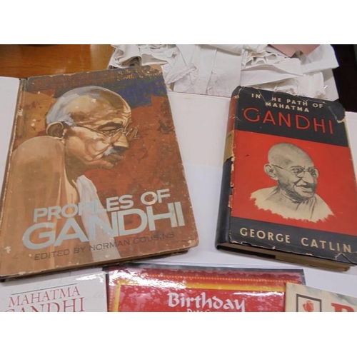 1193 - A collection of books and ephemera relating to Mohatma Ghandi.