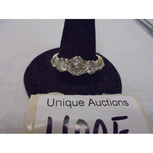 1100E - An 18ct 5 stone ring set early round brilliant/old cut diamonds, estimated diamond weight 4.25 metri... 