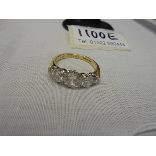 1100E - An 18ct 5 stone ring set early round brilliant/old cut diamonds, estimated diamond weight 4.25 metri... 