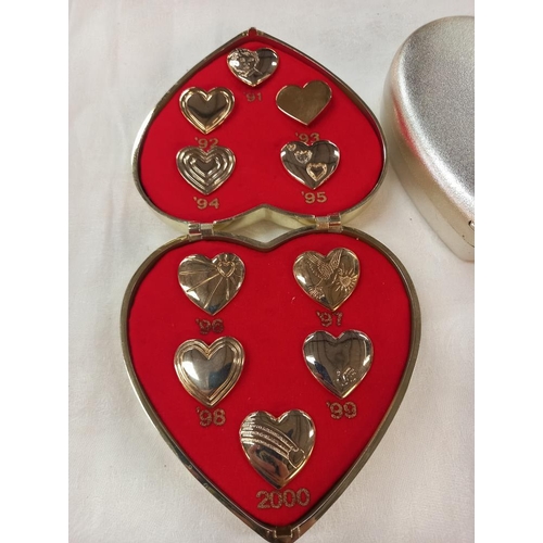 212 - 2 heart shaped boxes of Variety Club International pin badges