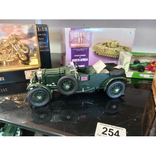 254 - A Franklin Mint 1929 Bentley length 19cm, boxed Corgi cc60105 North African Churchill tank, Maisto g... 