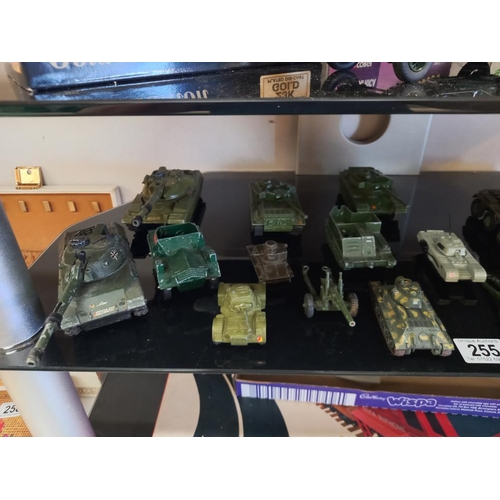 255 - A quantity of unboxed die cast military vehicles including Dinky, Corgi & Lone Star