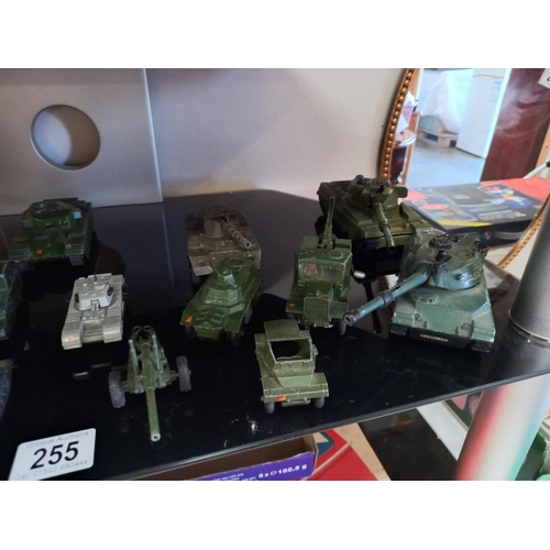 255 - A quantity of unboxed die cast military vehicles including Dinky, Corgi & Lone Star