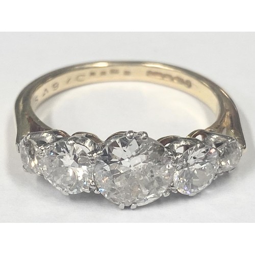 1100E - An 18ct 5 stone ring set early round brilliant/old cut diamonds, estimated diamond weight 4.25 metri... 