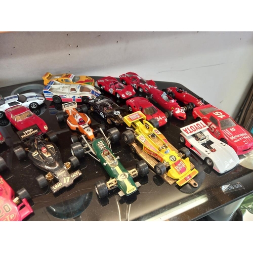 272 - A good selection of unboxed die cast racing cars including Corgi, Matchbox & Polistil etc.