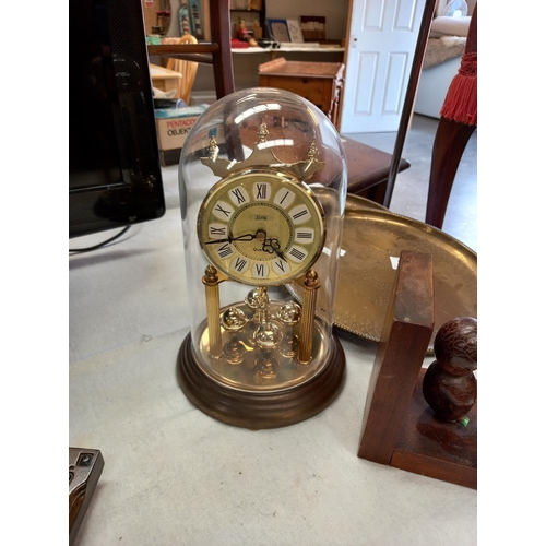 362 - 2 Indian brass trays, Anniversary clock under dome & pair of bird book ends COLLECT ONLY