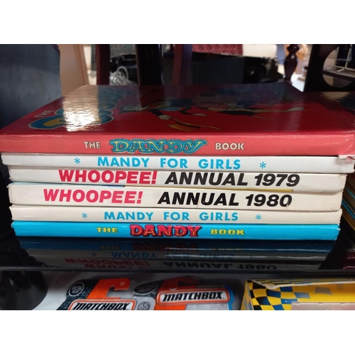 369 - A good lot of vintage annuals from the 70's/80's including Dandy, Whoopee!, Wham!, Bunty, Debbie, Ju... 