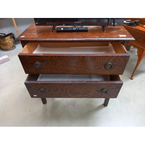 378 - A 1930's oak 2 drawer chest of drawers COLLECT ONLY