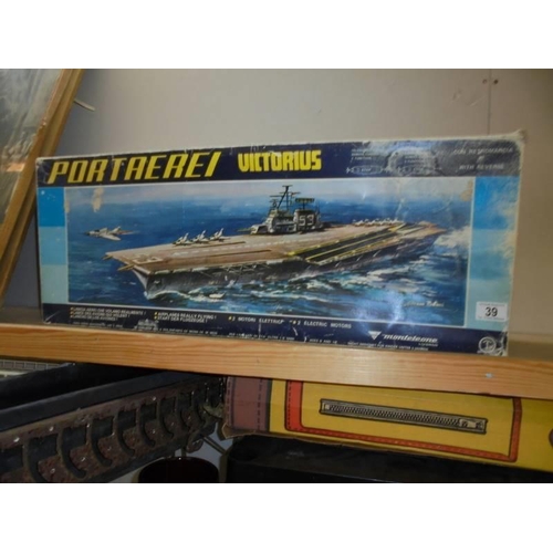 39 - A boxed Portarei Victorious aircraft carrier with 2 electric motors, completeness not known, COLLECT... 