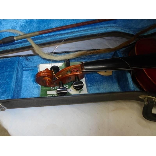 41 - A cased violin with bow, COLLECT ONLY.