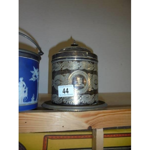 44 - A Jasper ware biscuit barrel and a silver plate biscuit barrel.