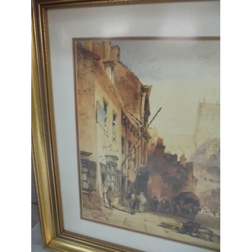 46 - A gilt framed and glazed print of Lincoln from bottom of steep hill, 72 x 55 cm, COLLECT ONLY.