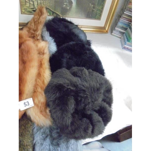 53 - Five fur stoles, four fur hats and two fur cuffs.