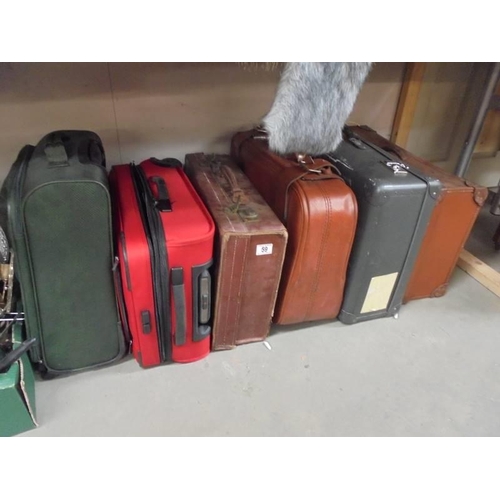 59 - Six suitcases including vintage examples, COLLECT ONLY.