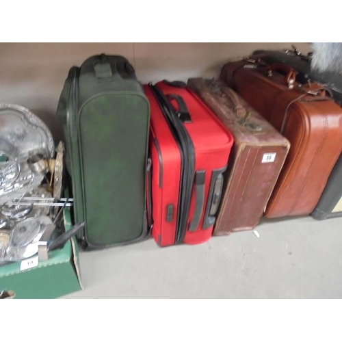 59 - Six suitcases including vintage examples, COLLECT ONLY.