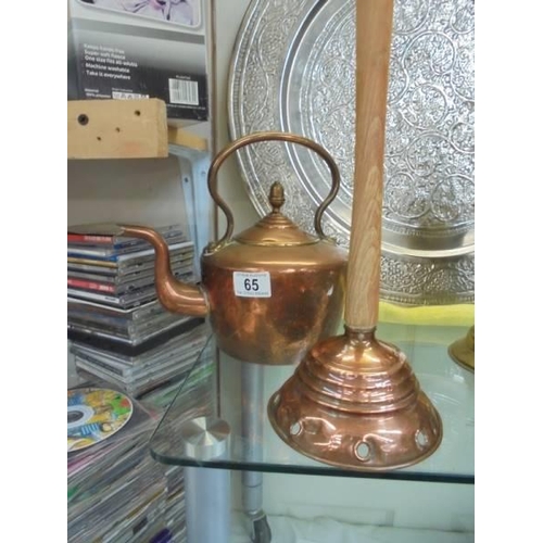 65 - A Victorian copper kettle and a copper washing posher.