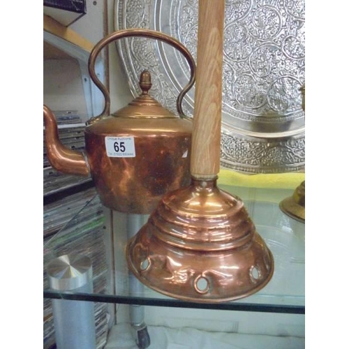 65 - A Victorian copper kettle and a copper washing posher.