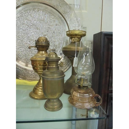 66 - Four old oil lamps, COLLECT ONLY.