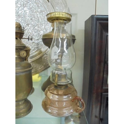 66 - Four old oil lamps, COLLECT ONLY.