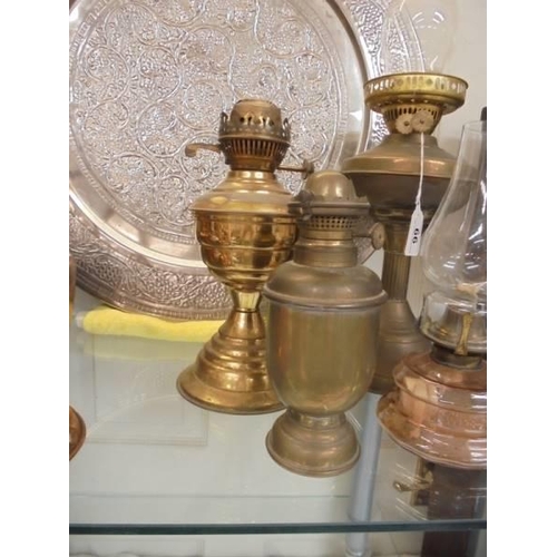 66 - Four old oil lamps, COLLECT ONLY.