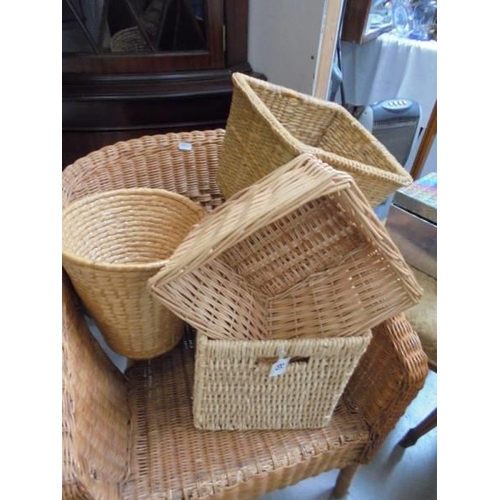 80 - A cane chair and a quantity of basket ware, COLLECT ONLY.