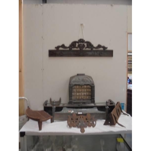 104 - A quantity of cast iron architectural items and a steel fender, COLLECT ONLY.