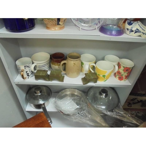 89 - Five shelves of ceramics, glass and three stainless steel pans, COLLECT ONLY.