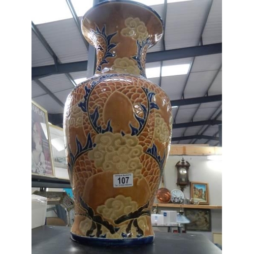 107 - A decorative pottery vase.