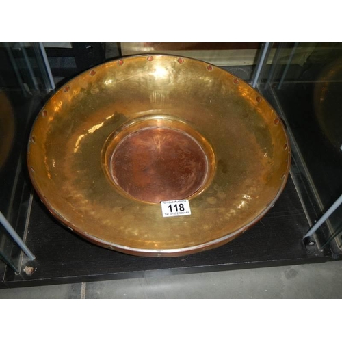 118 - A brass and copper bowl.