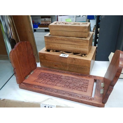 147 - Three wooden boxes and a wooden book rack.