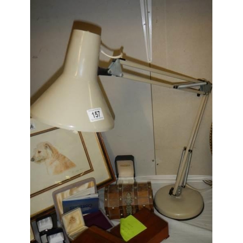 157 - An angle poise desk lamp.