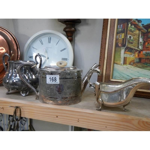 168 - A silver plate teapot, sugar bowl and gravy boat.