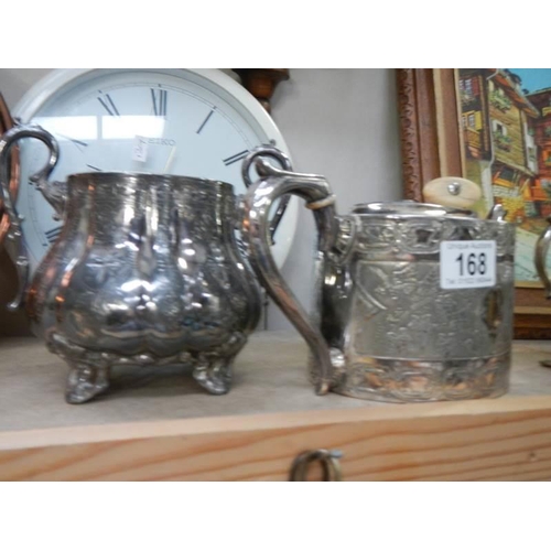 168 - A silver plate teapot, sugar bowl and gravy boat.