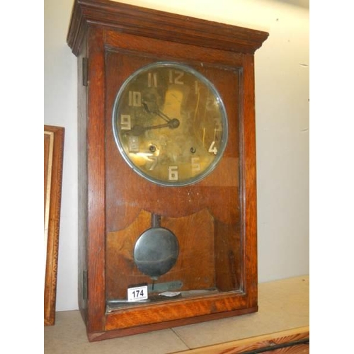 174 - An oak wall clock, COLLECT ONLY.