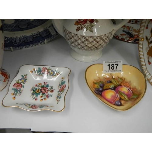 187 - A mixed lot including meat platter, plates, teapot, lidded jar etc., COLLECT ONLY.