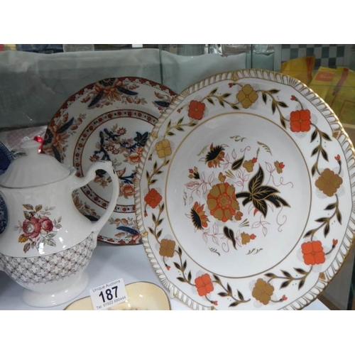 187 - A mixed lot including meat platter, plates, teapot, lidded jar etc., COLLECT ONLY.