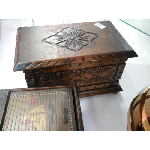 192 - An inlaid box and three others.