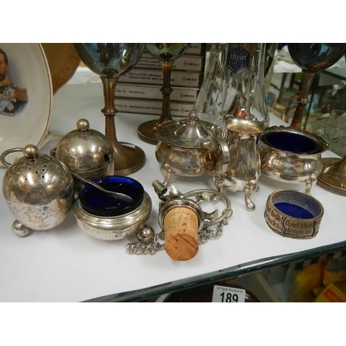 196 - A mixed lot of silver plate condiments, goblets etc.,