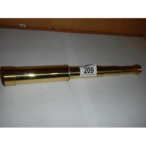 209 - A brass telescope.