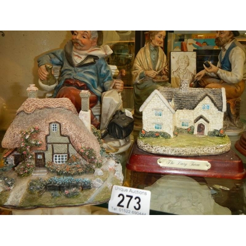 273 - Two cottages, a sheepdog with sheep and two other figures.