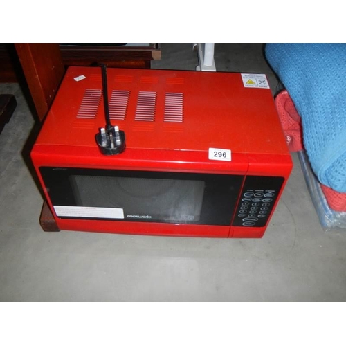 296 - A red Cookworks microwave oven. COLLECT ONLY.