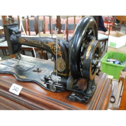 340 - A Singer sewing machine, COLLECT ONLY.