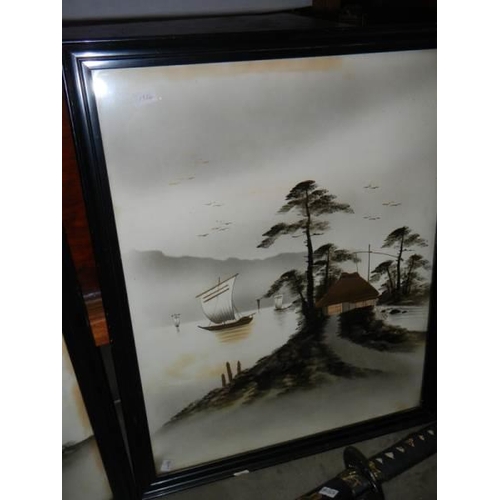 380 - A pair of framed and glazed oriental scenes,  COLLECT ONLY.