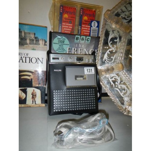 131 - A Philips cassette player together with language tapes.